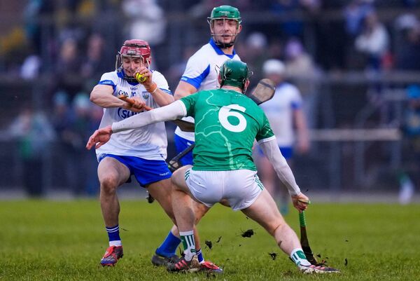Waterford's Joe Booth runs at Limerick's William O'Donoghue during their Co-op Munster Senior Hurling League Final played at Mallow GAA on Saturday last. Photos: INPHO/James Lawlor