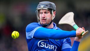 <p>Waterford's Billy Nolan landing a point from a free during the game against Limerick.</p>