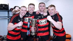 <p>BROTHERS-IN-ARM: Kevin, Philip, Pauric and Mikey Mahony pictured with the Tommy Moore Cup for a second time in the Croke Park dressing room after All-Ireland Club Senior hurling final win over Loughrea. </p>