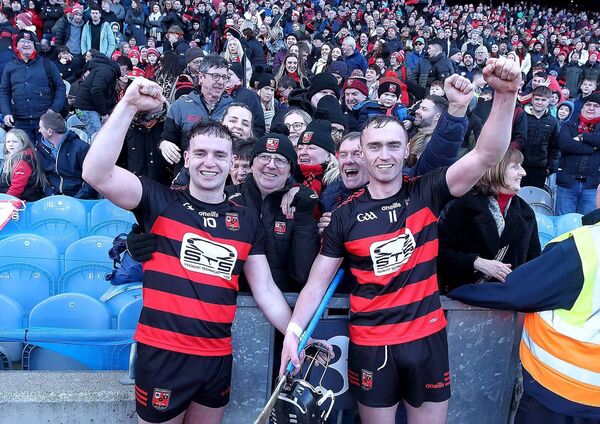 Ballygunner's Dessie Hutchinson and Pauric Mahony celebrating in front of their fans after All-Ireland Club Senior hurling final success over Loughrea. Photos: Noel Browne