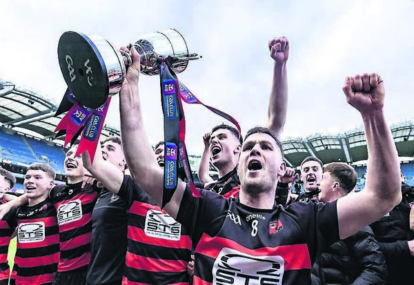 Ballygunner’s Conor Sheahan leads the celebrations in front of the Gunners fans in the Cusack Stand after their Tommy Moore Cup win over Loughrea at Croke Park. Photo: INPHO/Dan Clohessy