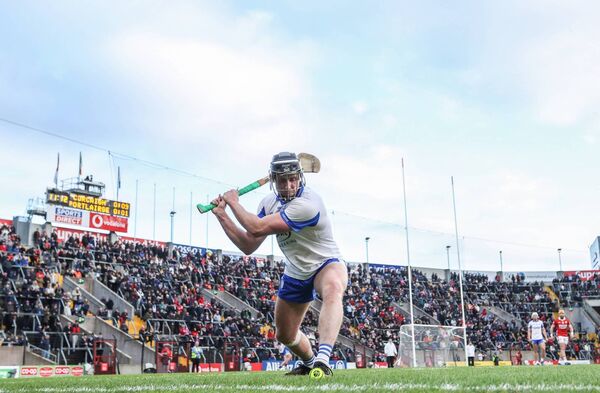 Waterford's Iarlaith Daly takes a sideline cut during their Allianz National Hurling League Division 1A clash with Cork played at SuperValu Pairc Ui Chaoimh on Sunday last. Photos: INPHO/Tom Maher 