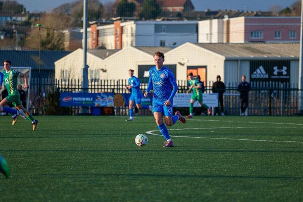 Blues defender Ronan Mansfield takes the ball out of defence during his side's clash with Kerry.