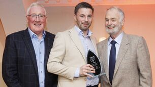 <p>Michael Hosey of Michael Hosey Fruit &amp; Veg Wholesalers and special guest Pat Spillane presents the Men’s Soccer award to Padraig Amond at the Carlow Sports Awards in association with the Nationalist. Photo: Michael O'Rourke Photography</p>