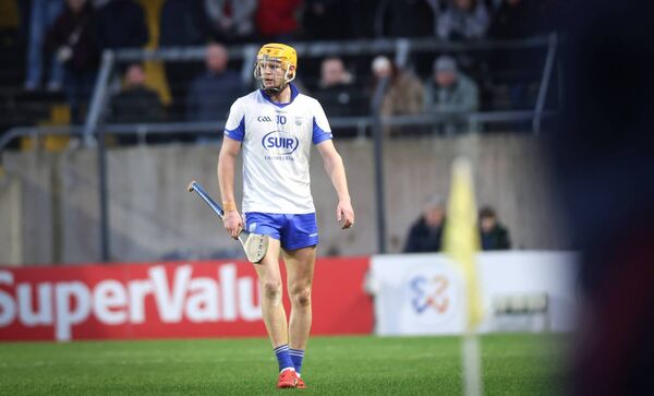 Waterford's Sean Walsh leave the field after being shown a red card against Cork.