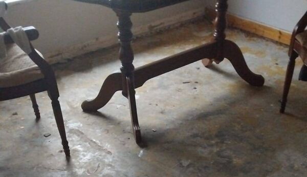 The floor of Ms Foley's has been taken up, making the apartment even colder. 