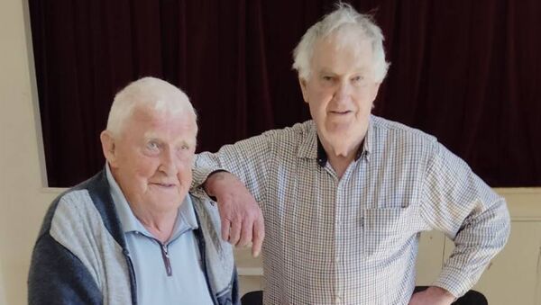 Paddy O'Shea and Tom Murphy of Tay and Mahon Valley ARA with Tom's pot of colcannon. Pic: Eileen Rabbett.