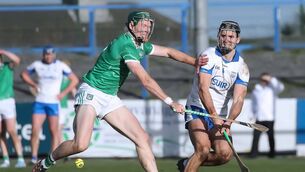 <p>Waterford's Mark Fitzgerald avoids the blockdown from Limerick's Will O'Donoghue. </p>
