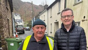 <p>Cllr Pat Fitzgerald and Deputy David Cullinane in Passage East </p>