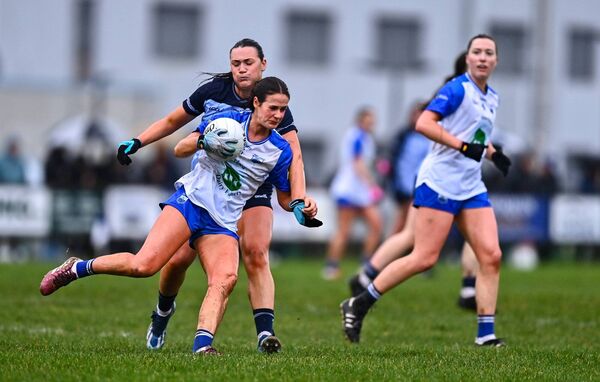 Áine O'Neill of Waterford in action against Niamh Hetherton of Dublin.