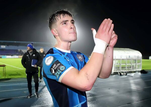 Waterford FC goalscorer Tommy Lonergan applauds the home fans after the game.