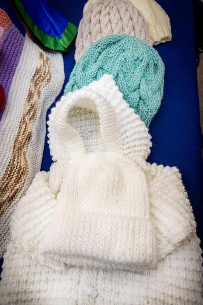  Hats and coats made by the Tuesday Knitting Club, Tramore, for the Neo-Natal Ward and the Oak Ward, at UHW.