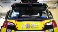 Woman (40s) and two boys hospitalised after house fire in Co Cork