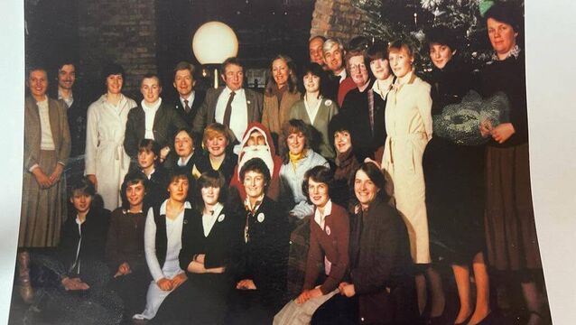 <p>Proprietors and staff of George's Court Shopping Centre at Christmas time in the early 1980s.</p>