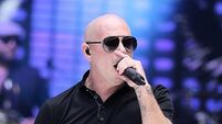 Pitbull to try and break record for largest gathering of people wearing bald cap