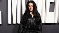 Charli XCX stuns in black leather ensemble at The Moment UK premiere