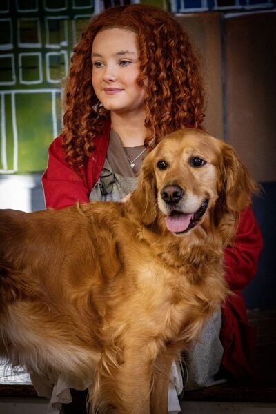 Erica (Annie) and Leia the dog, in Ballyduff Youth Drama's production of Orphan Annie. 