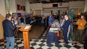 <p>Local community representatives met with new members of the Waterford community at St. Patrick's Gateway. Photo: John Power</p>