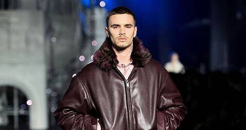 Romeo Beckham and Rosie Huntington-Whiteley on catwalk at London Fashion Week