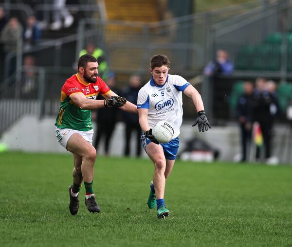 Waterford's Conor Murray gets away from Carlow's Sean Murphy.