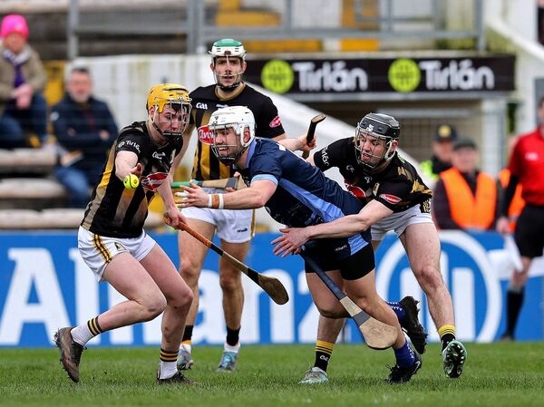 Waterford's Charlie Treen is surrounded by a host of Kilkenny players.
