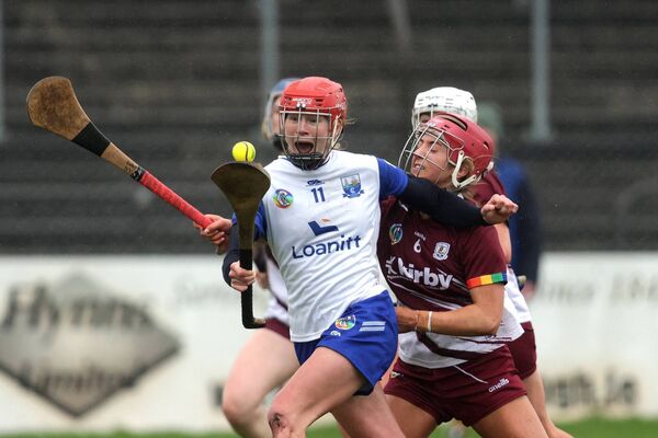 Waterford's Beth Carton tries to hold off the challenge of Galway's Ciara Hickey.