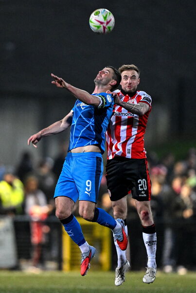 Waterford FC's Padraig Amond in an aerial duel with Derry's Carl Winchester. Photo: Sportsfile Waterford FC's Padraig Amond in an aerial duel with Derry's Carl Winchester. Photo: Sportsfile