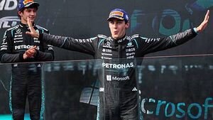 George Russell enjoys ‘hell of a fight’ to win season-opening race in Australia