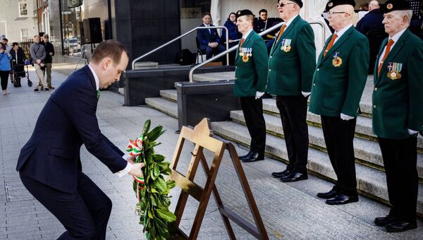 Minister John Cummins lays a wreath at the Tricolour Celebration, celebrating the 178th Year of the Irish Tricolour. Photo: Joe Evans