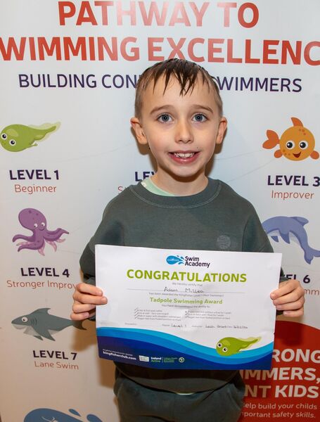  Adam Millea receiving his Level 1 Swimming Cert at Kingfisher recently.