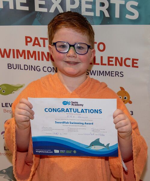  Alex Quinn receiving his Level 6 Swimming Cert at Kingfisher recently. Photo: John Power