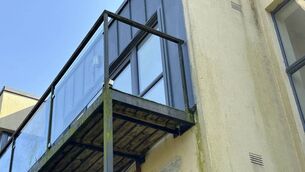 <p>The balcony in Mount Suir Manor Block C where two children reportedly fell from. Photo: Alex Cunningham</p>