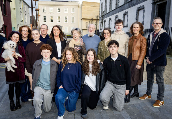  Blánaid MacCann, who received the Waterford News &amp; Star Green Room 2026 Lifetime Achievement Award, pictured here with her husband Liam, children and grandchildren. Photo: Joe Evans