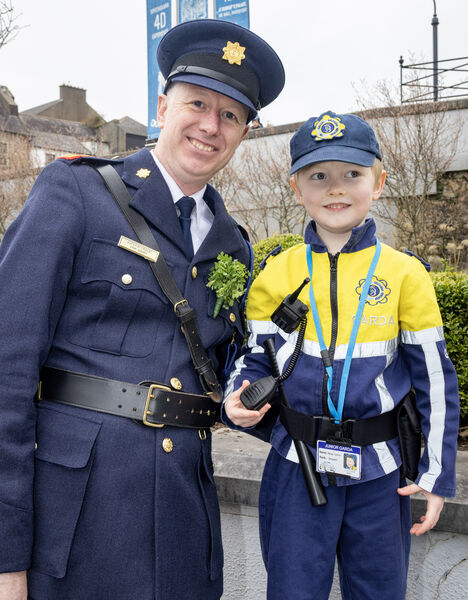  Superintendent Gavin Hegarty with young Sgt. Mikey Tymon, at the St. Patrick's Day Parade.