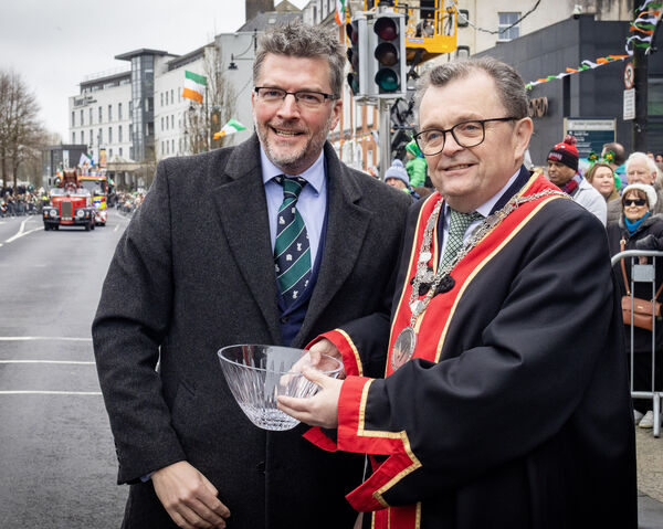 Grand Marshal Dr Morgan McMonagle, the 2025 recipient of the RCSI Humanitarian and Community Award for his commitment and service to protecting the lives of others and the welfare of humanity, is pictured with Mayor of Waterford City & County Cllr Seamus Ryan at the St. Patrick's Day Parade in the city. Grand Marshal Dr Morgan McMonagle, the 2025 recipient of the RCSI Humanitarian and Community Award for his commitment and service to protecting the lives of others and the welfare of humanity, is pictured with Mayor of Waterford City & County Cllr Seamus Ryan at the St. Patrick's Day Parade in the city.