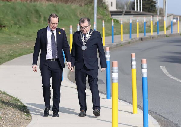 Mayor of Waterford City and County Council Cllr Seamus Ryan and Minister of State for Local Government and Planning John Cummins taking a tour of the Safe Routes to School works at Scoil Mhuire National School, Butlerstown.