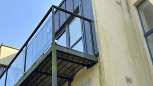 <p>The balcony in Mount Suir Manor Block C where two children reportedly fell from. Photo: Alex Cunningham</p>