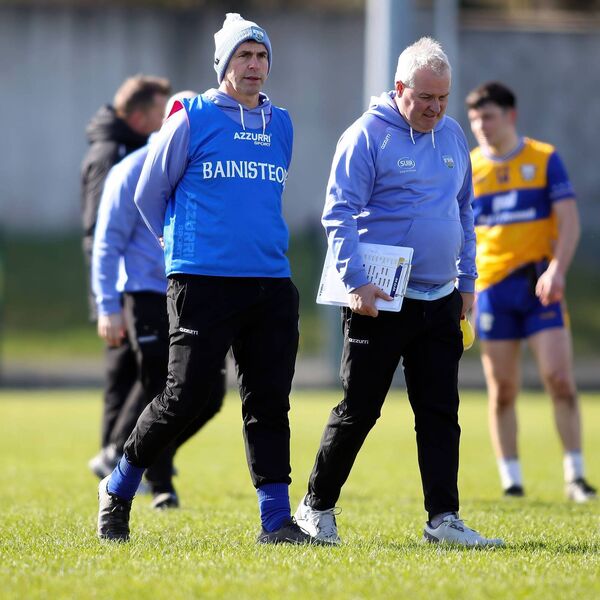 Waterford manager Paul Power with backroom member Michael O'Loughlin.