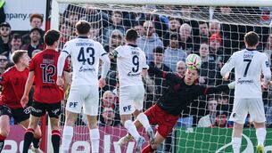 <p>Waterford's John Mahon scores his side's goal past Bohemians' goalkeeper Kacper Chorazka</p> <p>Waterford's John Mahon scores his side's goal past Bohemians' goalkeeper Kacper Chorazka</p>