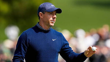 Rory McIlroy claims share of lead in hunt for back-to-back Masters victories