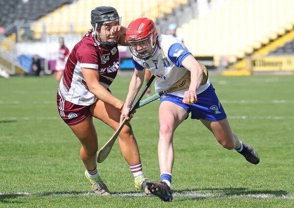 Waterford's Beth Carton closely marshalled by Galway's Dervla Higgins. Waterford's Beth Carton closely marshalled by Galway's Dervla Higgins.