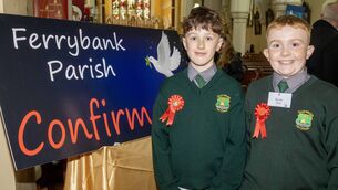 <p>friends Connor Baldwin and Oisin Droney, St. Mary's BNS Ferrybank who were confirmed at the Sacred Heart Church Ferrybank. Photo: Joe Evans</p>