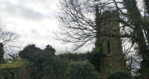 Graveyard in Waterford sinking into adjacent field