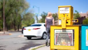 <p>A Santa Fe New Mexican vending machine features a newspaper headline reading "The American pope,” a day after Pope Leo XIV was elected.</p>