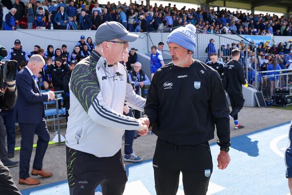 Clare Manager Brian Lohan and Waterford Manager Peter Queally shake hands at the final whistle