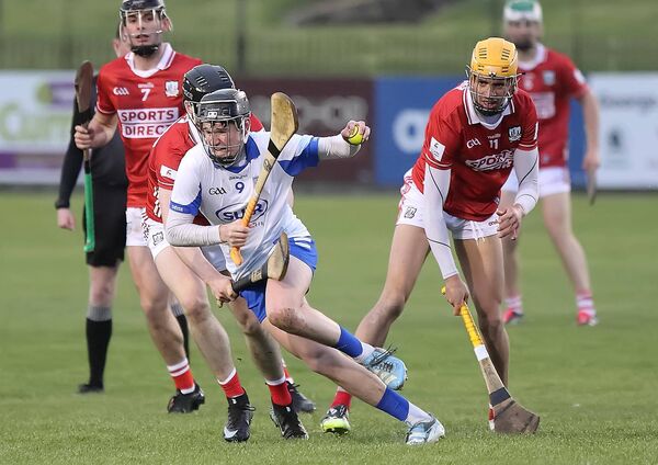 Waterford's Paddy Spellman gets away from Cork's Johnny Murphy.