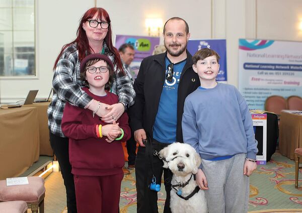 Bridget, Harry, Tom and Tommy Jacob with Pablo the support dog at the Include Us All Forum in the Granville Hotel.