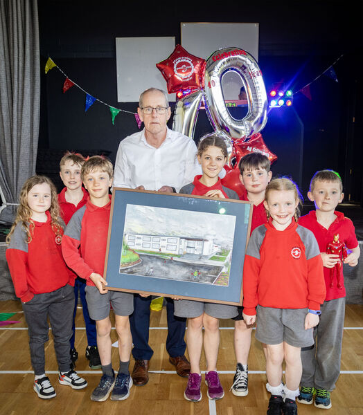  Members of the Comhairle na nDaltaí committee with Gaelscoil Philib Barún school Principal Daithí de Paor, with the painting presented by the Parents Association to mark the school's 40th anniversary.