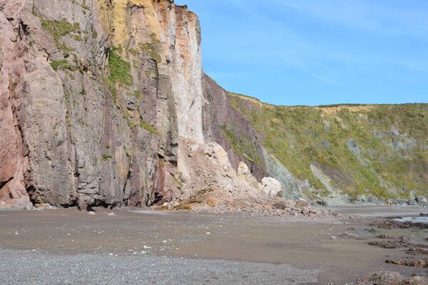 This image captured by Michael Faulkner shows the large amount of earth and rocks that fell at Ballydwane Cove. Pic: Michael Faulkner.