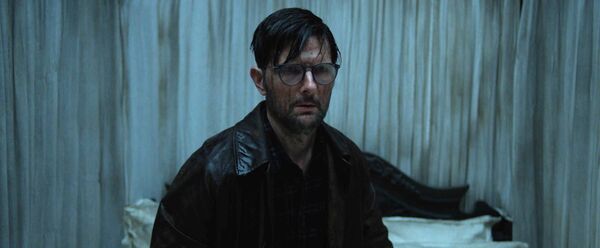 A scene from Hokum featuring Adam Scott. A scene from Hokum featuring Adam Scott.